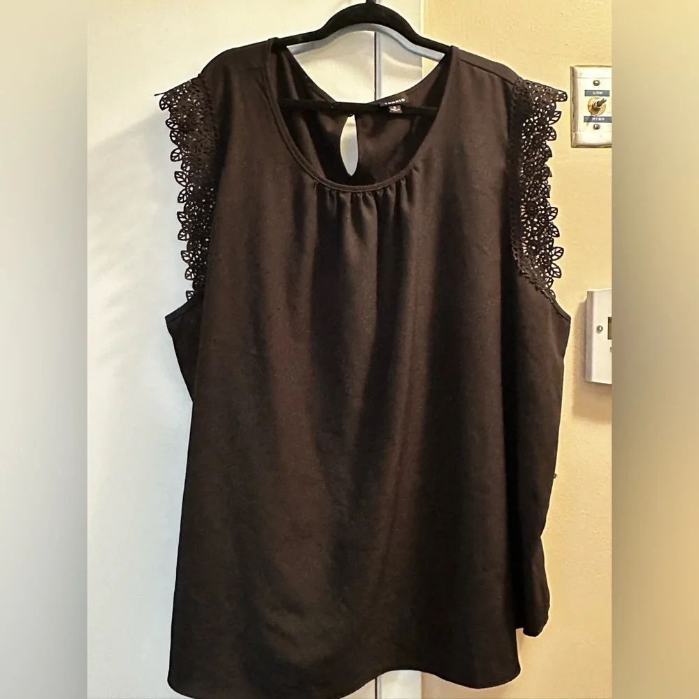Torrid black top with detailed sleeves